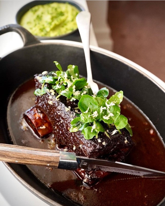 Lavish New Year's Eve Dinner Party Ideas That Will Impress Your Guests - Braised Short Ribs with Garlic-Thyme Brown Butter by Chef Laurent Toroundel